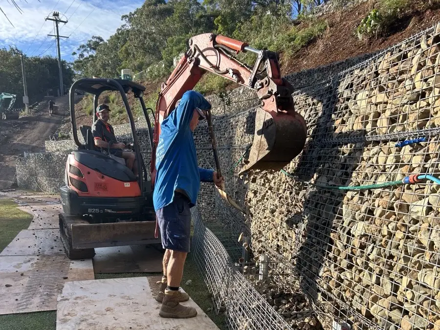 Gabion retaining wall under construction